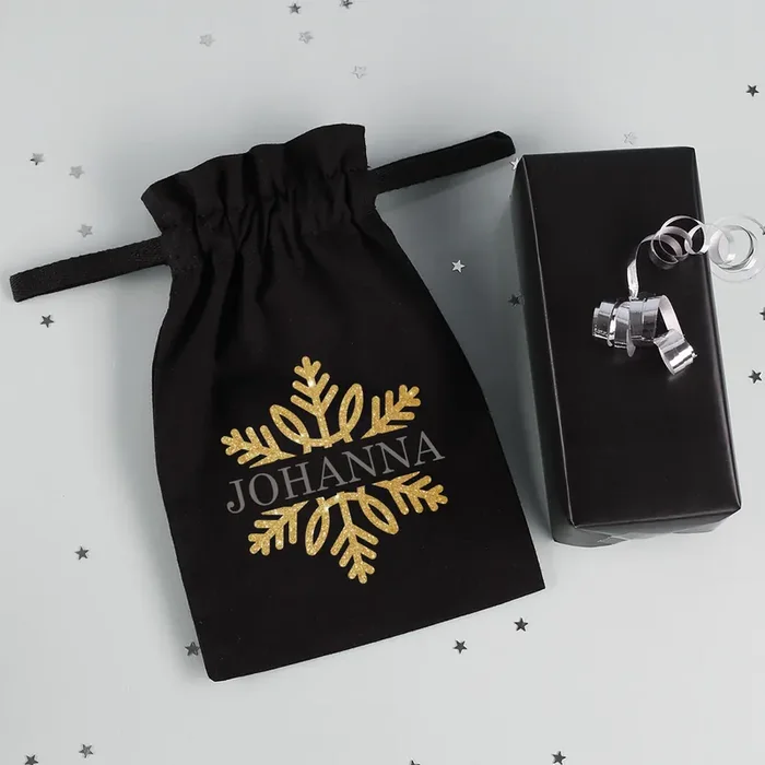 Kleiner Geschenksack zu Weihnachten mit Schneeflocke und Name bedruckt, 21x14cm